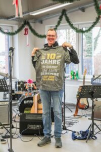 Mitarbeiter Wolfgang Häßner wird für 10-jährige Betriebszugehörigkeit geehert